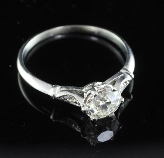 A white gold and single stone diamond ring, size M.